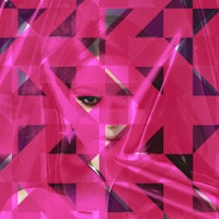 a woman's face is covered in a pink fabric